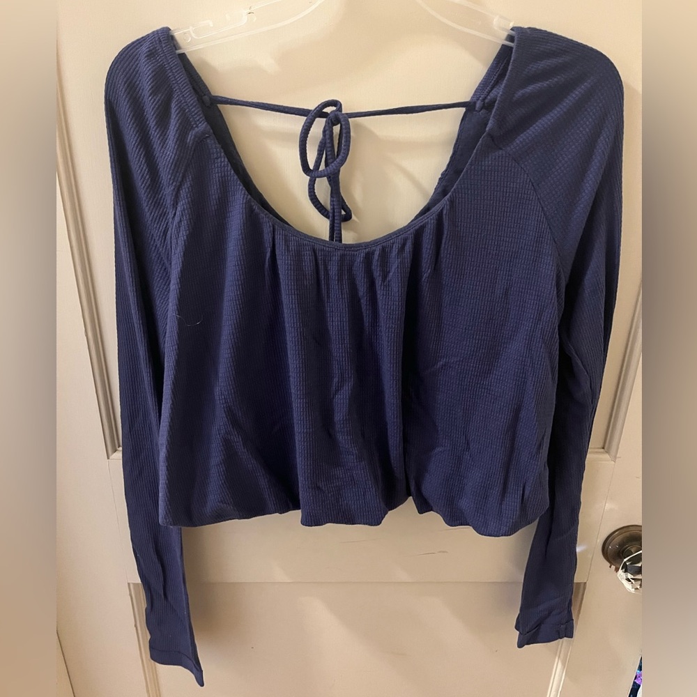 Free people, size small. Purple cropped long sleeve shirt.